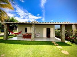 242 Casa da Praia em Condomínio Frente Mar，位于阿拉卡茹的乡村别墅