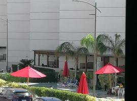 شالية غرفة ورسيبشن وحمام ومطبخ عمارة 4 الدور الأول，位于塞得港的公寓式酒店