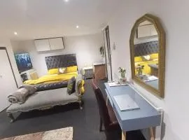 A Cosy Deluxe Size Studio With Queen size and Sofa Bed