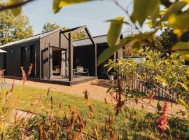 Knus I Tiny house op de Veluwe，位于伊皮的酒店