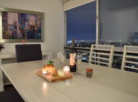 Penthouse Espectacular Vista Cd A.C. WiFi 300mbps，位于瓜达拉哈拉的带热水浴缸的酒店