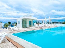 DUCASSI Suites ROOMS & BEACH - playa Bavaro - WiFi - Parking - ROOFTOP POOL & SPA ，位于蓬塔卡纳的公寓