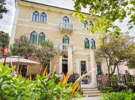 DeGrassi Boutique Garni Hotel Izola，位于伊佐拉的酒店