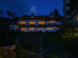 Kameya Hotel，位于鹤冈市加茂水族馆附近的酒店