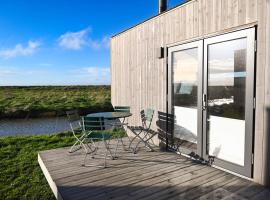 Tiny House Pioneer 18 Zur Meerseite - Green Tiny Village Harlesiel，位于卡罗利嫩西尔的酒店