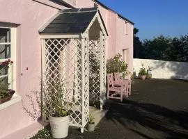 The Pink Cottage upstairs suite & Garden Summer Room