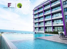 Fortune Saeng Chan Beach Hotel Rayong - SHA Plus，位于罗勇巴生南帕沙木佛塔附近的酒店