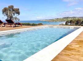 Espectacular Villa con acceso privado a la playa de Oyambre，位于圣维森特-德拉巴尔克拉的度假屋