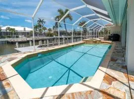 ELEVATED 342 - Sunny Waterfront Pool and Spa 3 Bed home