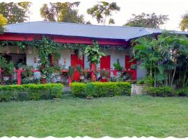 Atmaja The Cottage Garden Home Stay Malda Under Tourism Department Government of West Bengal，位于Māldah的山林小屋