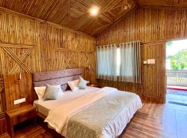 Bamboo Garden Cottages and Cafe，位于瑞诗凯诗Dehradun Airport - DED附近的酒店