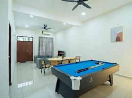 NEW-Batu Pahat 10pax Mahjong Snooker BBQ，位于峇株巴辖的酒店