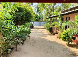 Suman Beach Rooms，位于尼拉瓦利的带停车场的酒店