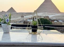Golden Pyramids View Inn，位于开罗的酒店