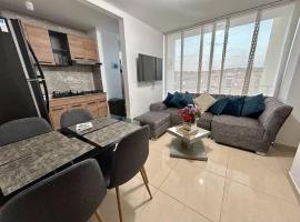 Lindo apartamento de 3 habitaciones，位于库库塔的公寓