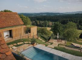 Am Wildbachberg - Luxus Ferienhäuser mit Infinitypool, Privatsauna und Weinkeller，位于德意志兰茨贝格的酒店