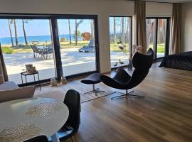 Rannamaja kümblustünni & saunaga，位于Haapse的酒店