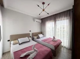 Twin house 4 master Bedrooms premium mountain view Ras Elhikma