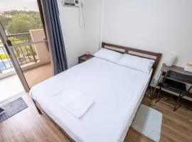 2BR Fully Air-Conditioned Staycation PLUS Free Parking