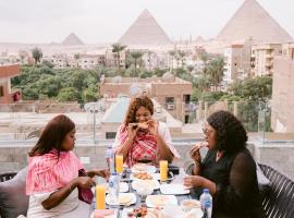 Tuya Pyramids Hotel Inn，位于开罗的酒店