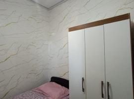 Quarto em Apartamento no Centro，位于大坎普的民宿