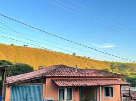 Casa Leela Canastra - Área externa e fogão a lenha，位于瓦尔任博尼塔的酒店