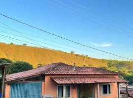 Casa Leela Canastra - Área externa e fogão a lenha