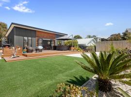 Lazy Sands - Mount Maunganui Holiday Home，位于芒格努伊山的酒店