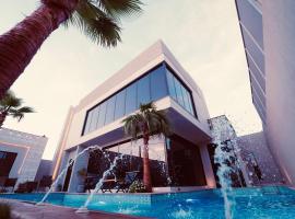 Pool villa فيلا من ثلاث غرف نوم，位于Butainiyāt的度假屋