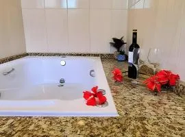Apê Cabana com hidro casal, lareira e ar condicionado