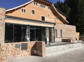 Chalet-Hôtel La Mainaz Restaurant & Resort，位于热克斯米茹拉方希滑雪学校附近的酒店