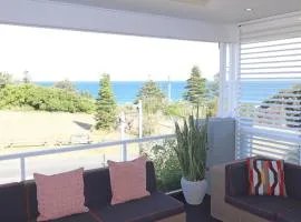 The Sands views over Caves Beach