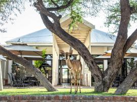 Otjibamba Lodge，位于奥奇瓦龙戈乌达比布盐沼附近的酒店
