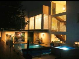 Suite de huéspedes, con alberca，位于库奥蒂特兰伊斯卡伊的酒店