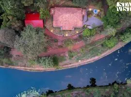 StayVista at Villa Estuaire Homestay A Cozy Riverside Escape with Lawn & Free Breakfast