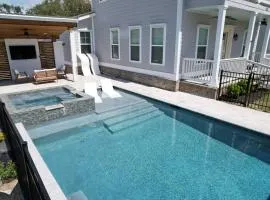 Walk to Beach with Heated Pool Spa views & oak trees