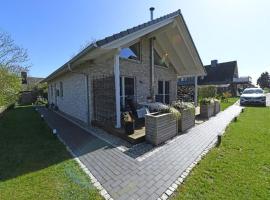 New family bungalow in Schlagsdorf on Fehmarn，位于Schlagsdorf的带停车场的酒店