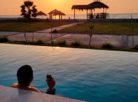 Hermosa casa frente al mar con piscina，位于帕拉卡斯的酒店