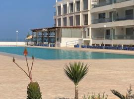 Appartement pied dans l’eau à 10 min d’Agadir，位于奥瑞尔的酒店