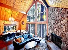 Glimmer Chalet Treetop A-frame cabin lake view