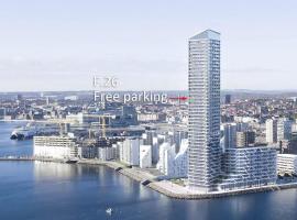 26-Etage Lejlighed med Utrolig Havudsigt，位于奥胡斯的酒店