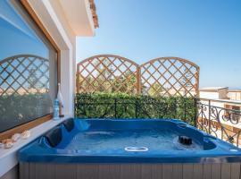 Casa Di cuore Suite Sea View - with Jacuzzi，位于阿凯松的酒店