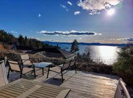 Flaskebekk at Nesodden with unbeatable Oslo Fjord views and a private beach hut，位于Nesoddtangen的乡村别墅