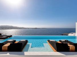 Dazzling Mykonos Villa | Villa Lvellie | 6 Bedrooms | Unique Aegean Sea Views | Private Infinity Pool | Two Private Jacuzzis | Psarou Beach，位于萨鲁的度假屋
