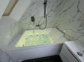 Le Duplex Balnéo Maison climatisée