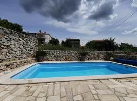Apartment Andrea with pool and seaview