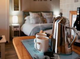 Dassenheuwel Farm Stay Cottages，位于Malmesbury的酒店