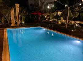 Magnifique villa avec piscine，位于迦玛特的酒店
