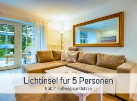 Ferienwohnung Lichtinsel - strandnah, ebenerdig, haustierfreundlich, großer Garten, optimal für Familien，位于斯泰恩伯格的酒店