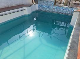 Cityscape Retreat with private Pool，位于班加罗尔的酒店